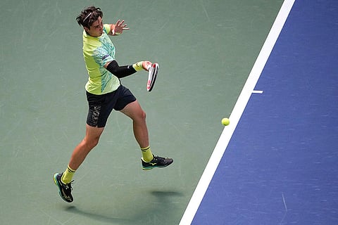 US Open 2024: Alexander Shevchenko, of Kazakhstan, returns a shot to Frances Tiafoe, of the United States